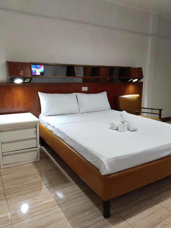 Postel nebo postele na pokoji v ubytování 2 Hotel Saleh