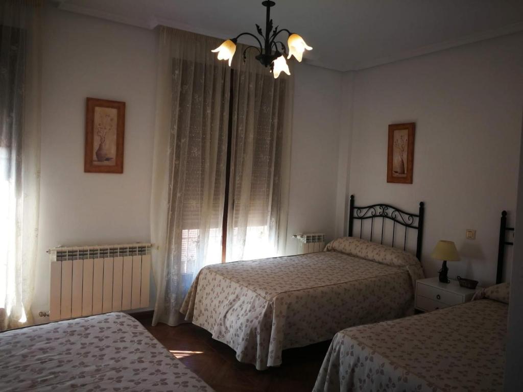 Postel nebo postele na pokoji v ubytování Casa Rural La Malena