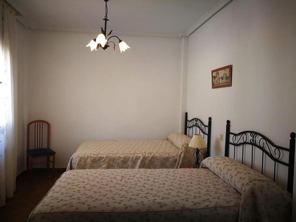 Postel nebo postele na pokoji v ubytování Casa Rural La Malena