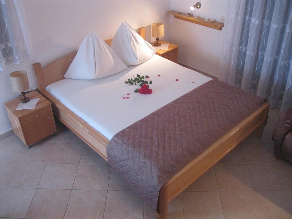 Posteľ alebo postele v izbe v ubytovaní Apartments Villa Macola