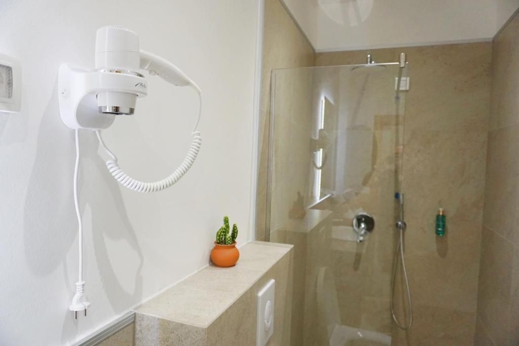 Koupelna v ubytování Hotel Credo