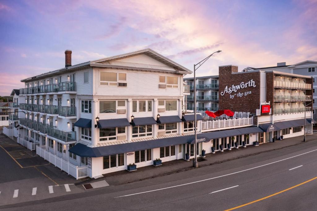 a rendering of a white building on a street at Ashworth by the Sea in Hampton