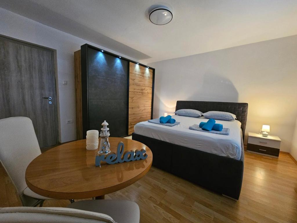 Postel nebo postele na pokoji v ubytování Apartma RELAX