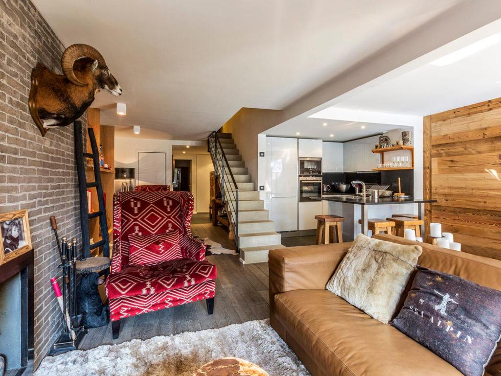Appartement duplex haut de gamme avec cheminée au cœur de Val-d'Isère, proche des pistes et commodités