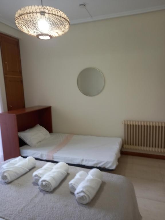 Posteľ alebo postele v izbe v ubytovaní Apartamento primera línea playa d samil
