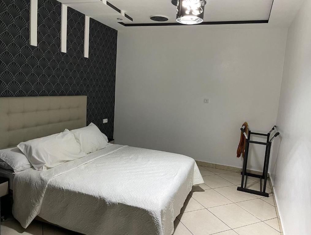 Postel nebo postele na pokoji v ubytování Shrif Appart-Luxe