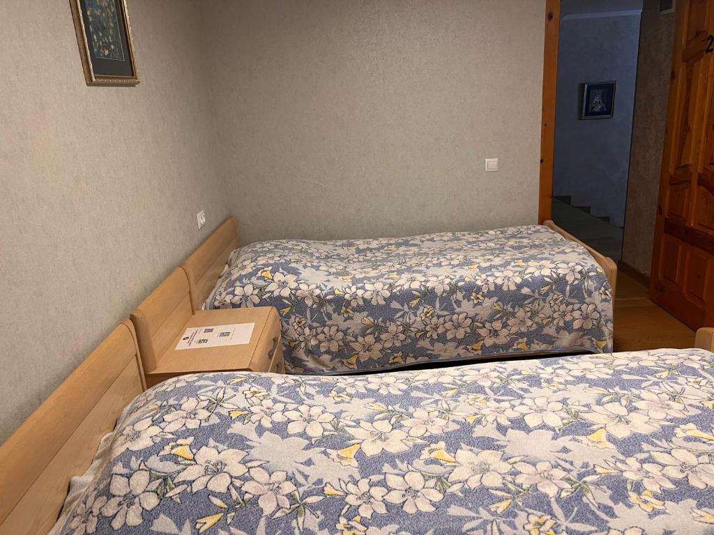 Postel nebo postele na pokoji v ubytování Brewery House&Beer Spa