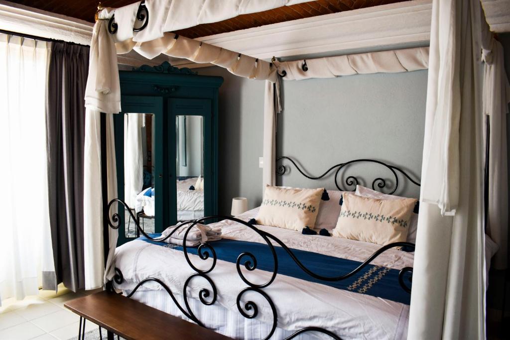 Postel nebo postele na pokoji v ubytování Mansion San Miguel