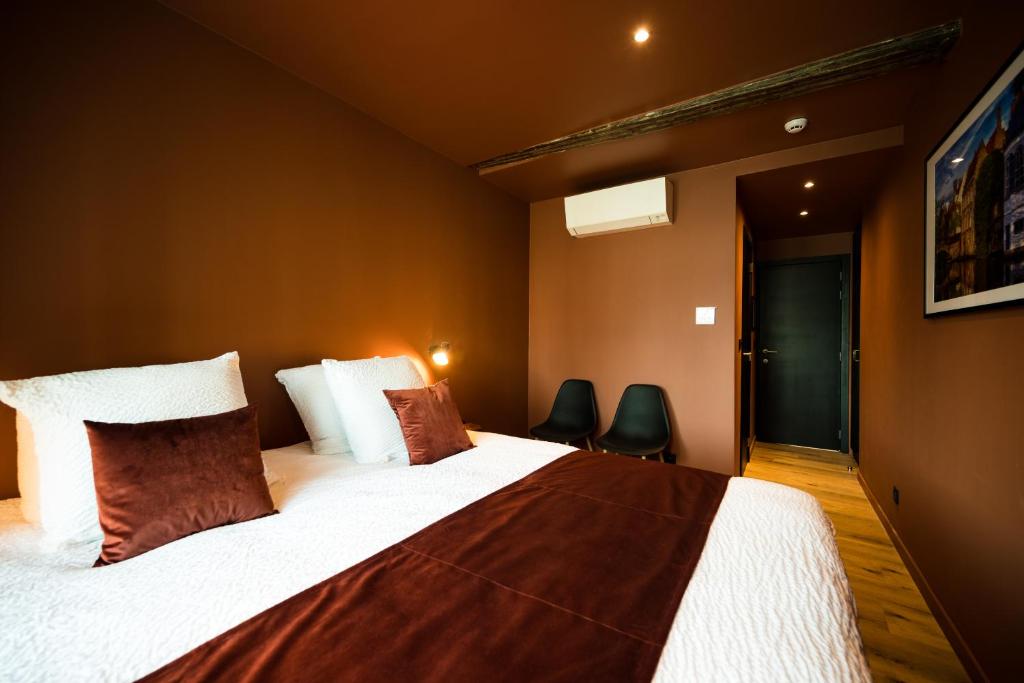 Postel nebo postele na pokoji v ubytování Guest House La Civière d'or