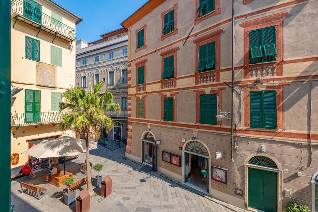 an overhead view of a city street with buildings at In the heart of Finalmarina in Finale Ligure