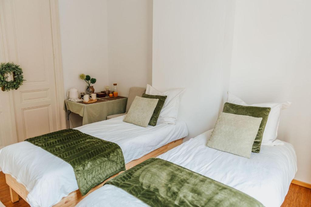 Postel nebo postele na pokoji v ubytování Ambiorix Residence