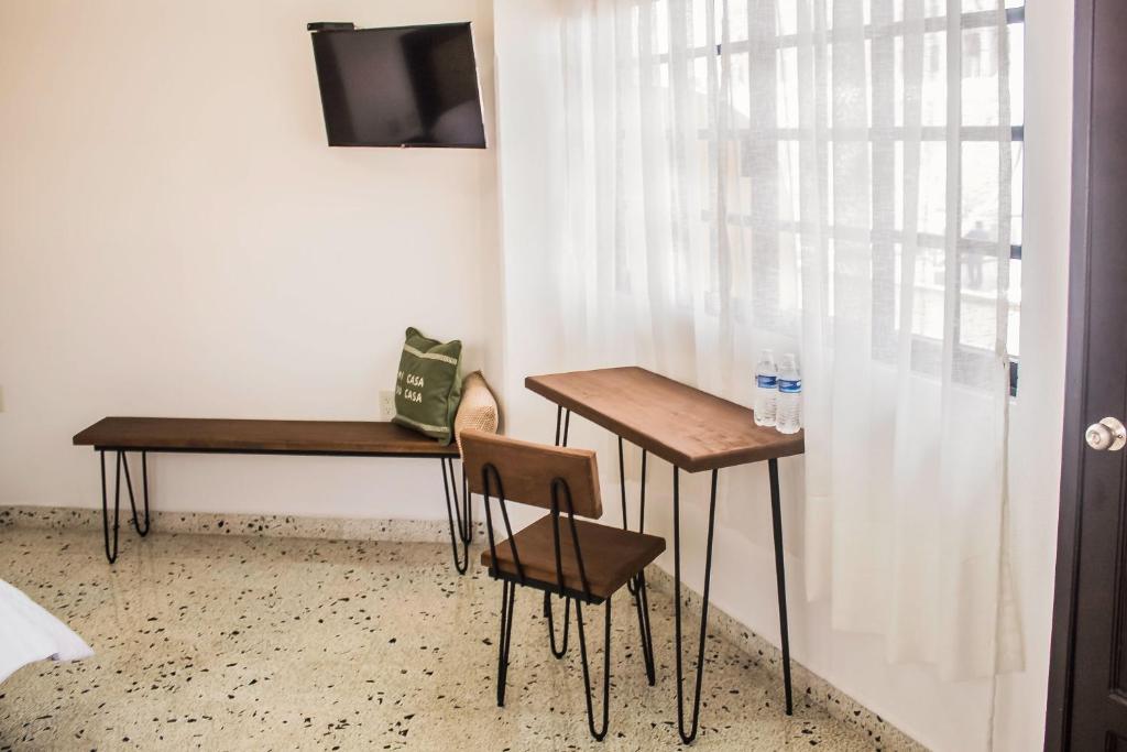 TV a/nebo společenská místnost v ubytování Múcara hotel