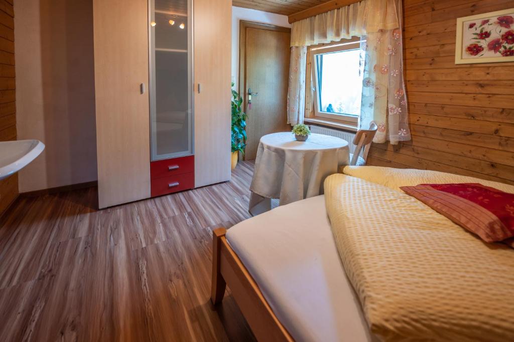 Postel nebo postele na pokoji v ubytování Haus Waldrast