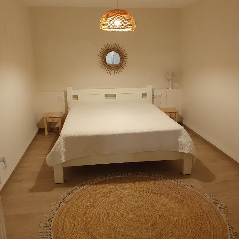 Postel nebo postele na pokoji v ubytování היחידה בגומא