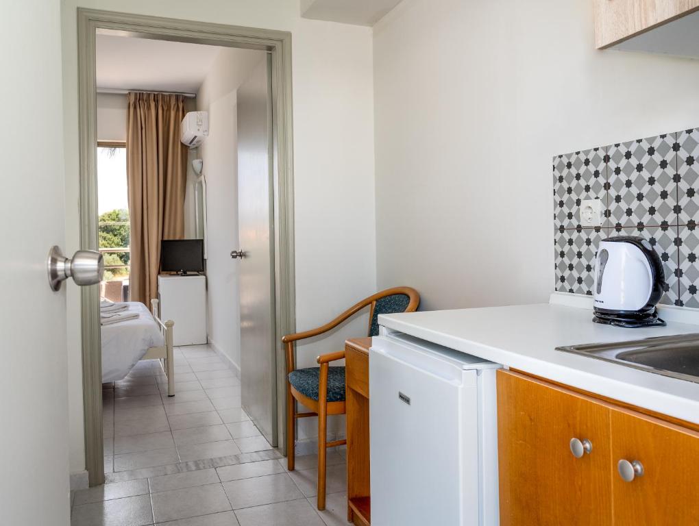 Voodi või voodid majutusasutuse IVORY HOTEL toas