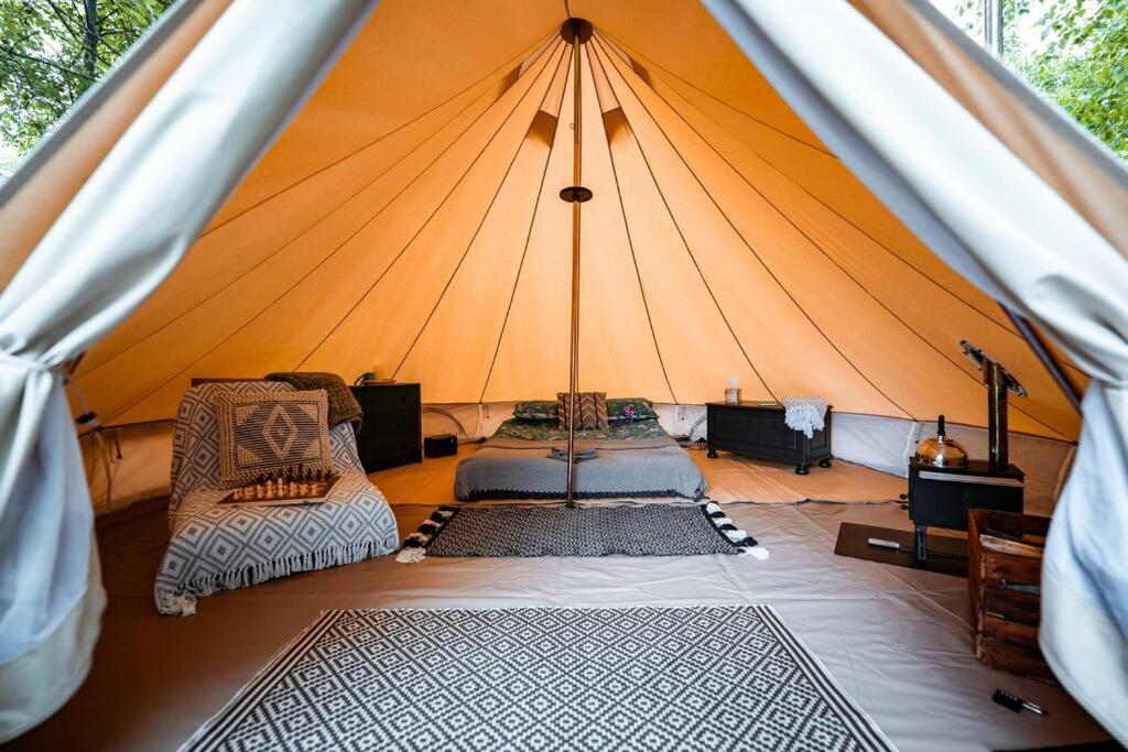 Ein Bett oder Betten in einem Zimmer der Unterkunft Yatu Ecological Glamping
