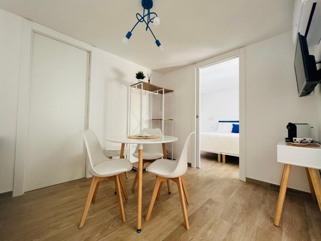TV a/nebo společenská místnost v ubytování Via Giardini Rooms