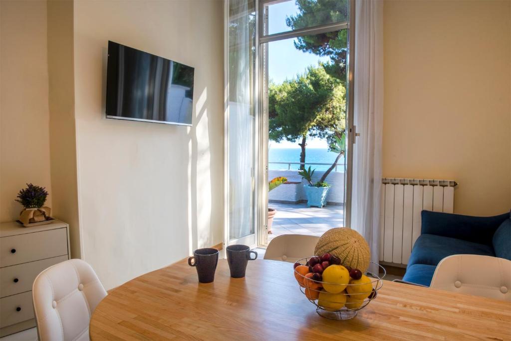 Télévision ou salle de divertissement dans l'établissement Vento Verde Apartments