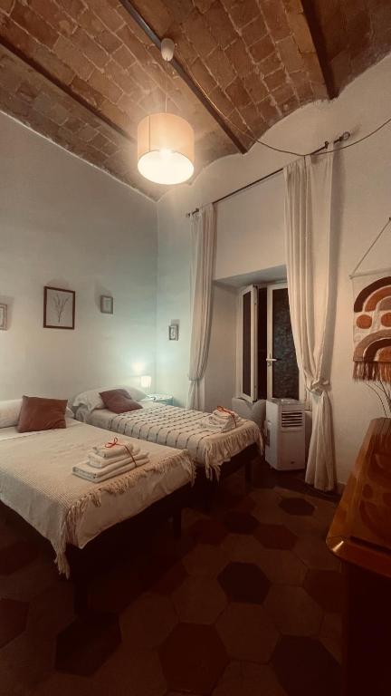 Łóżko lub łóżka w pokoju w obiekcie La maison b8