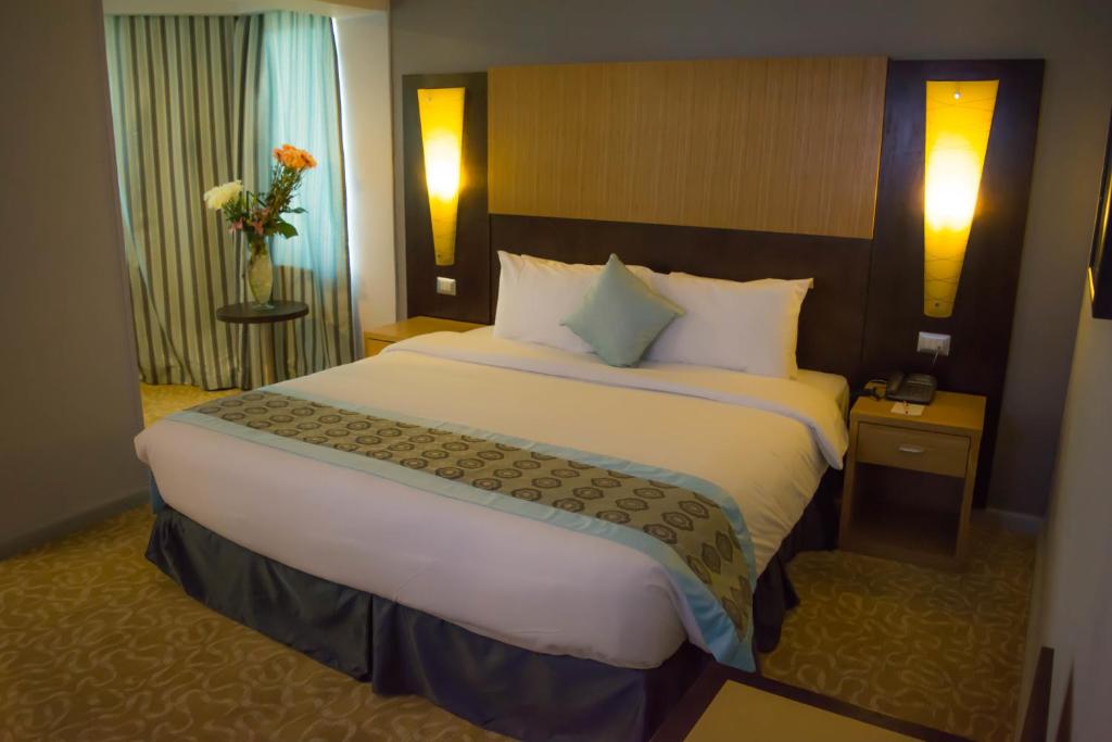 Postel nebo postele na pokoji v ubytování Tolip El Galaa Hotel Cairo