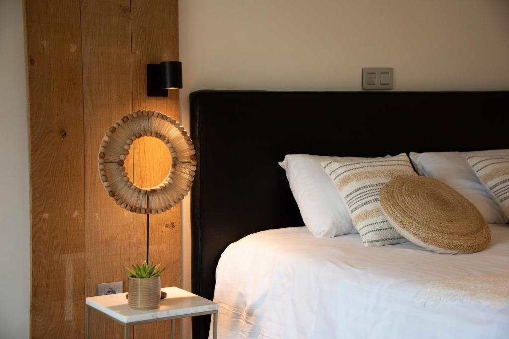 Postel nebo postele na pokoji v ubytování Boutique Hotel Het Zoete Zijn