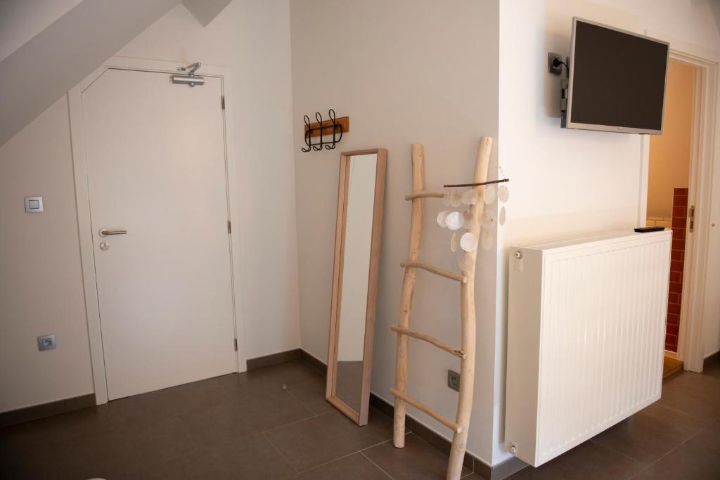 TV a/nebo společenská místnost v ubytování Boutique Hotel Het Zoete Zijn