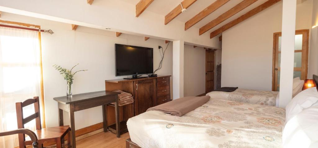 Postel nebo postele na pokoji v ubytování SAMANA B&B