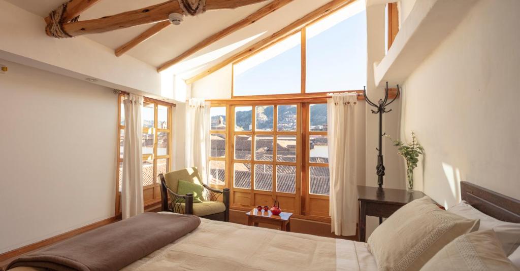 Postel nebo postele na pokoji v ubytování SAMANA B&B