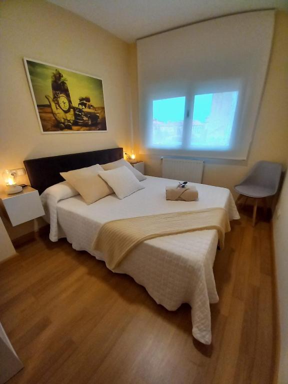 Postel nebo postele na pokoji v ubytování Apartamento Aurora