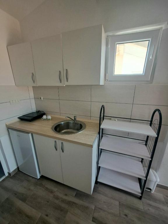 Köök või kööginurk majutusasutuses Apartman Hana