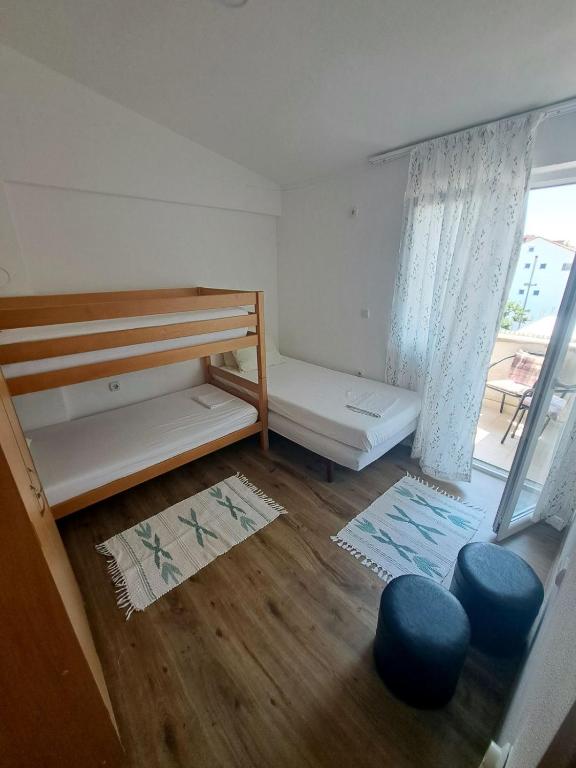 Voodi või voodid majutusasutuse Apartman Hana toas