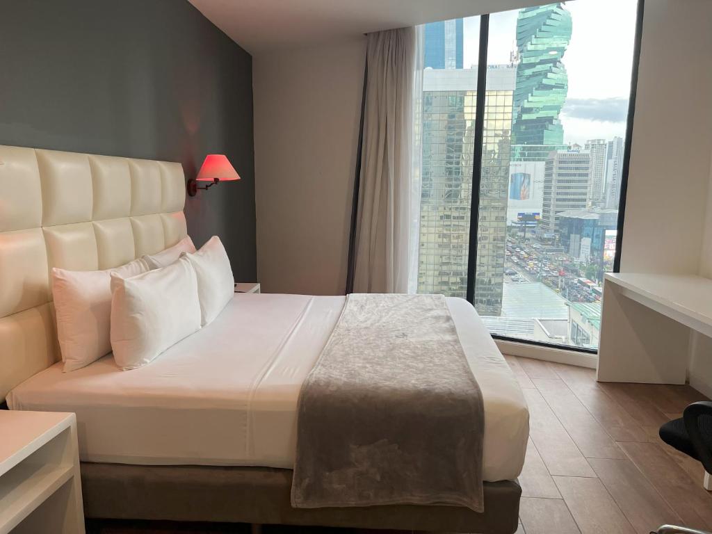 Postel nebo postele na pokoji v ubytování Hotel Mio Panamá