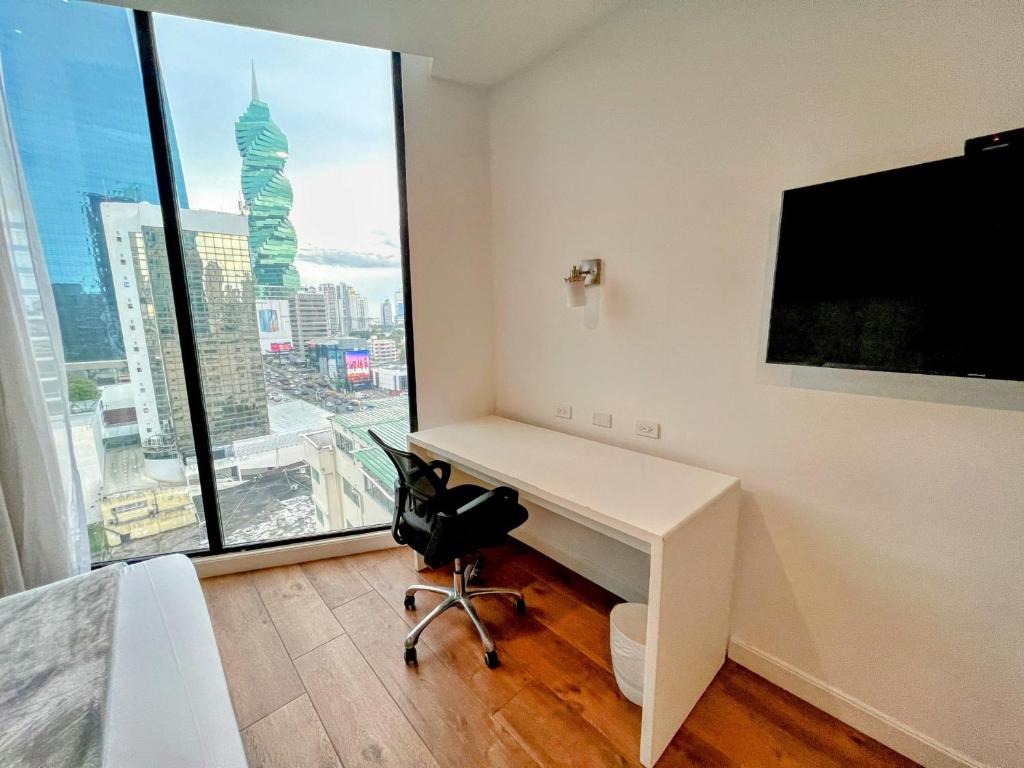 TV a/nebo společenská místnost v ubytování Hotel Mio Panamá