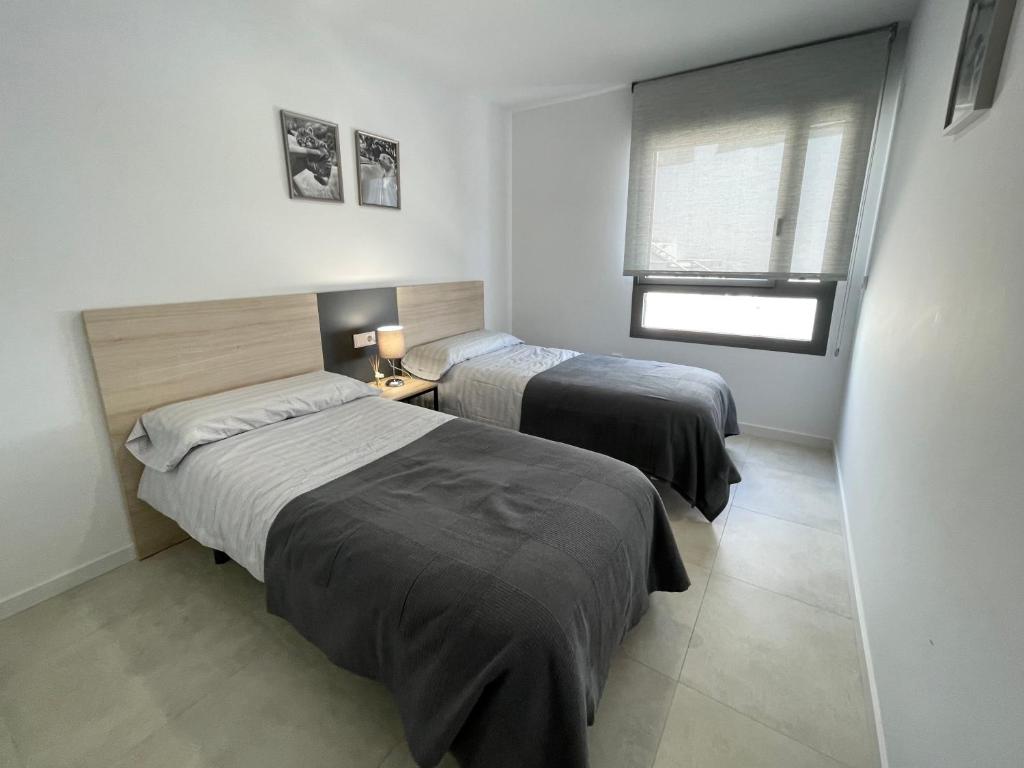 Postel nebo postele na pokoji v ubytování SEASCAPE LUXURY APARTMENT