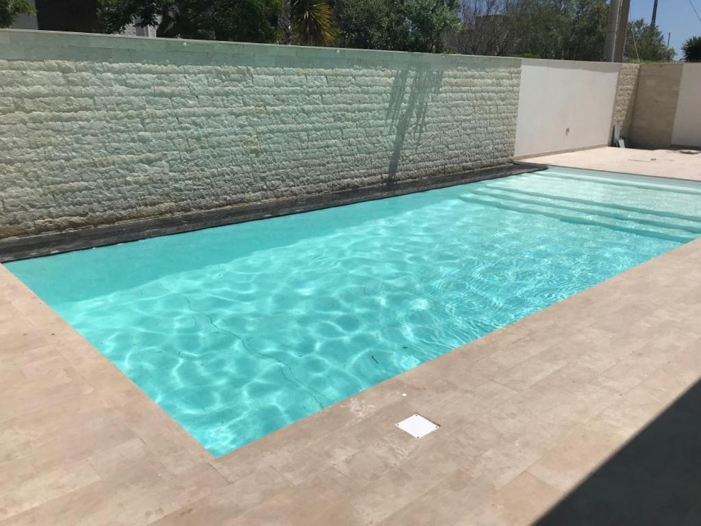 Bazén v ubytování Appartamento Oasi con Piscina nebo v jeho okolí