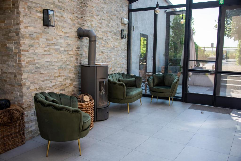 Posezení v ubytování Boutique Hotel Het Zoete Zijn