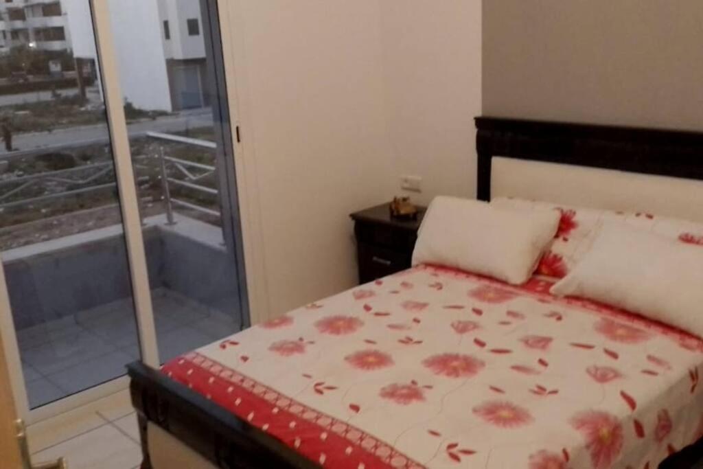 Postel nebo postele na pokoji v ubytování Appartement calme et agréable