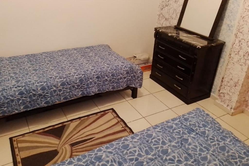 Postel nebo postele na pokoji v ubytování Appartement calme et agréable