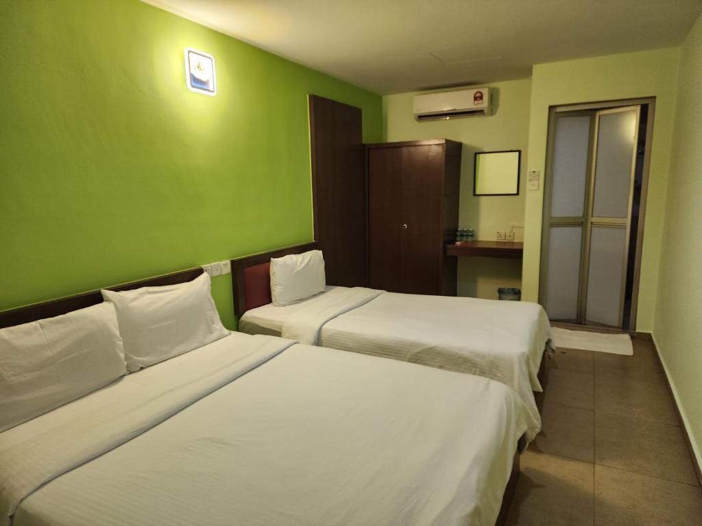 Postel nebo postele na pokoji v ubytování U HOTEL