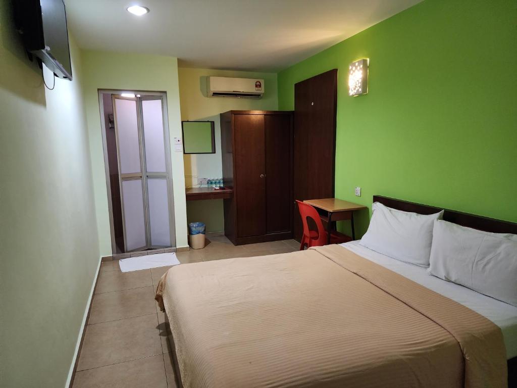 Postel nebo postele na pokoji v ubytování U HOTEL