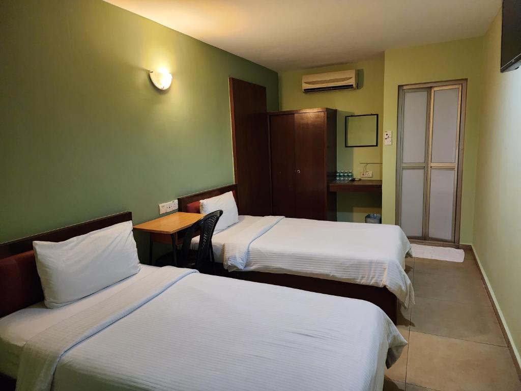 Postel nebo postele na pokoji v ubytování U HOTEL
