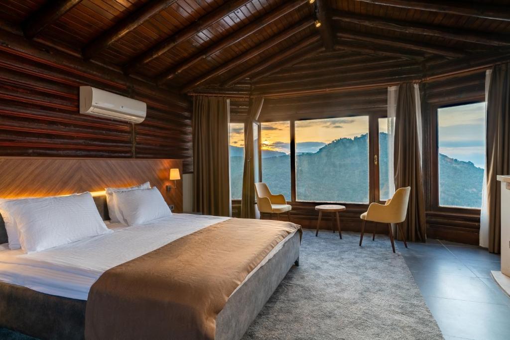 Postel nebo postele na pokoji v ubytování Assos Kartal Yuvasi Hotel