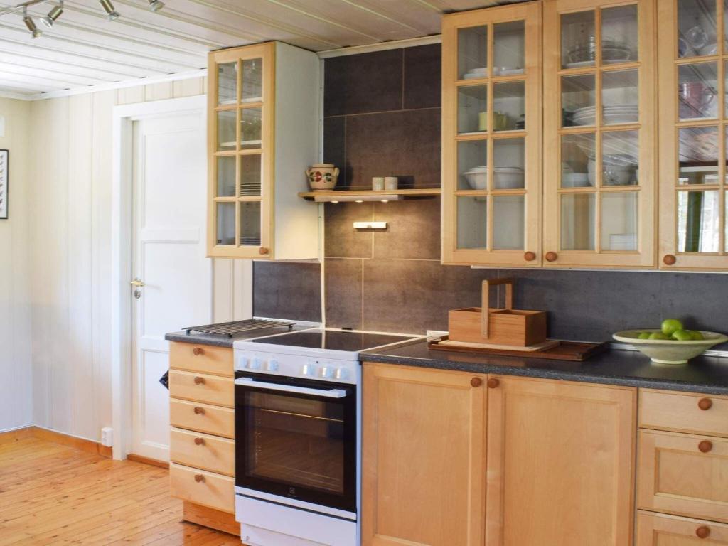 Kuchyň nebo kuchyňský kout v ubytování Holiday home Halden IV