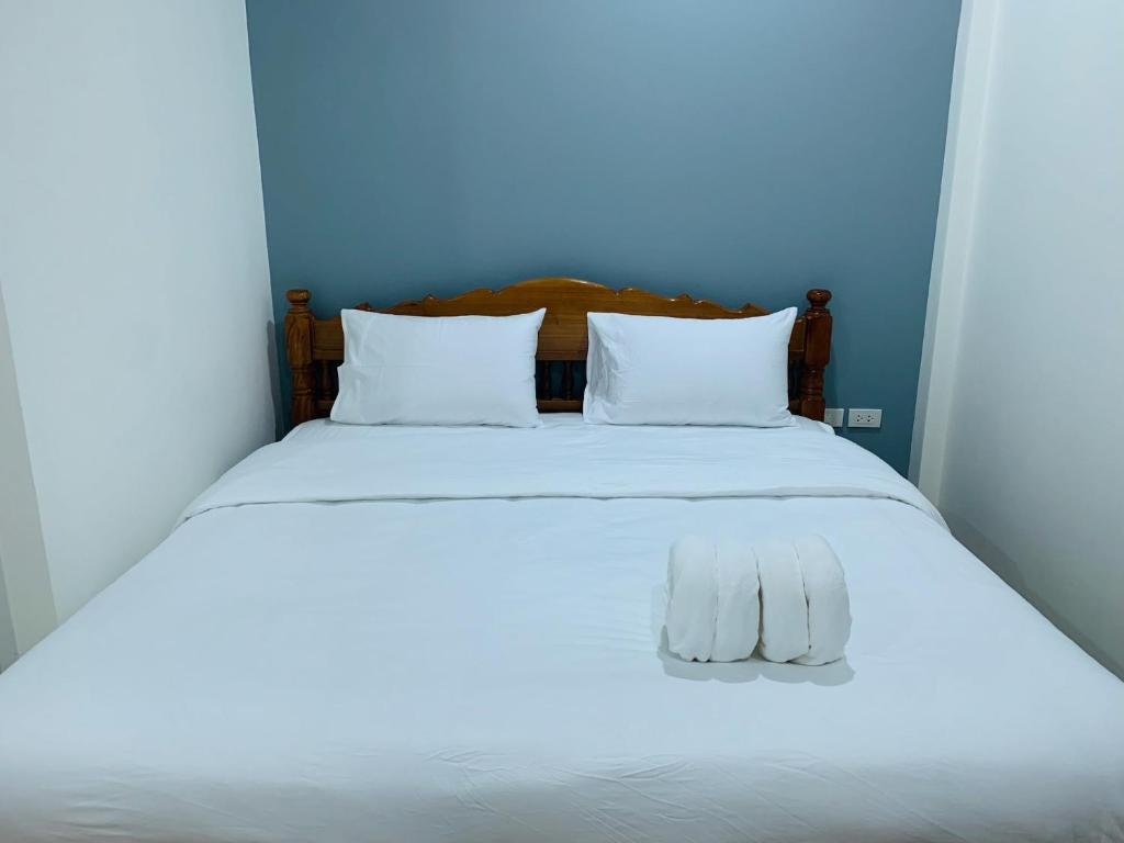 Postel nebo postele na pokoji v ubytování Suanvadee Resort สวนวดี รีสอร์ท