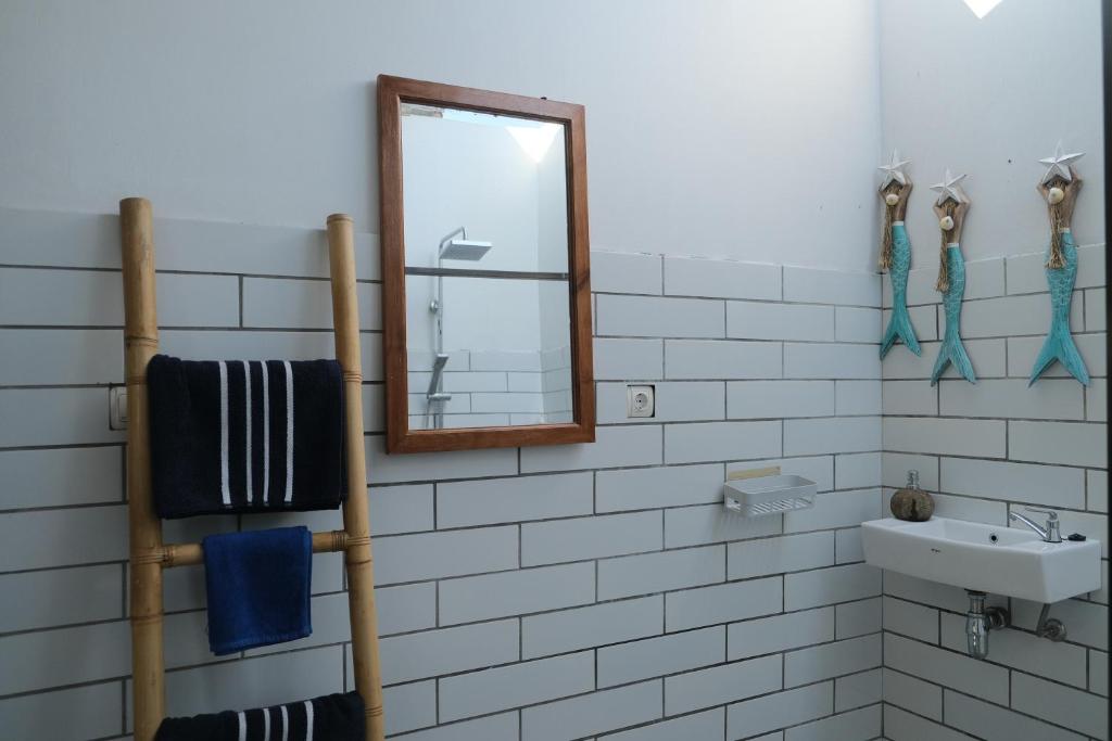 Koupelna v ubytování Hideaway Batukaras