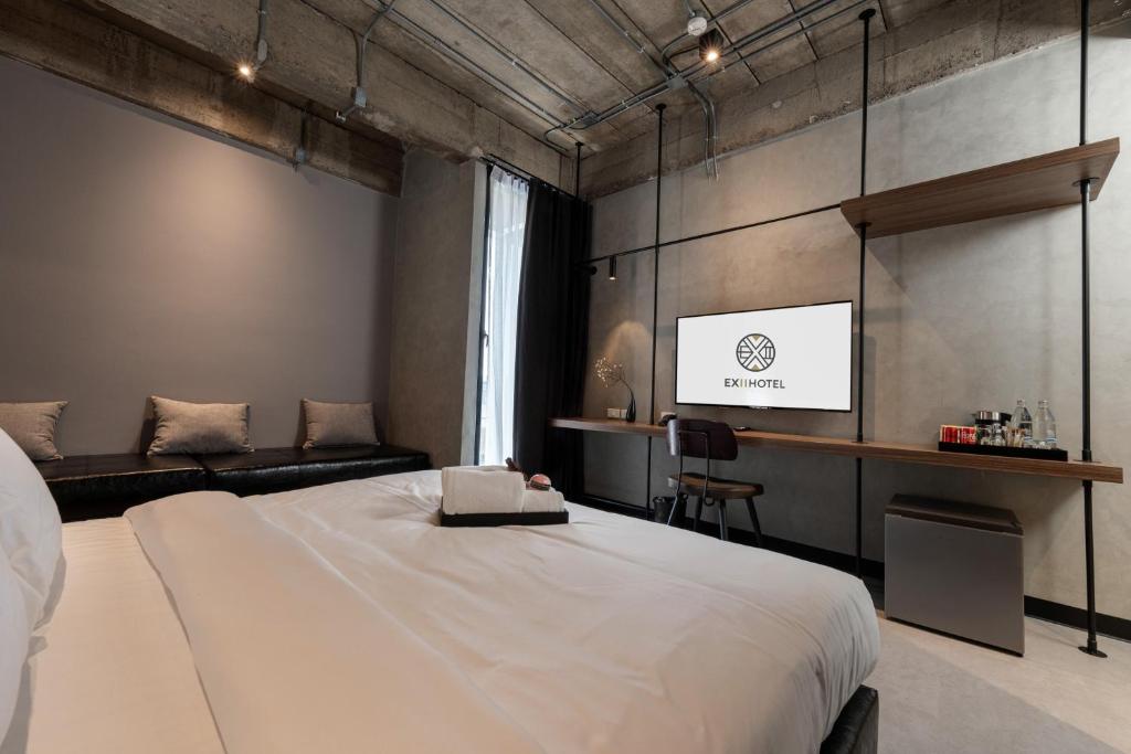 EX2 Hotel - Cuarto King
