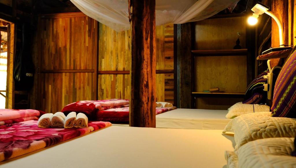 Postel nebo postele na pokoji v ubytování Plei Homestay & Café