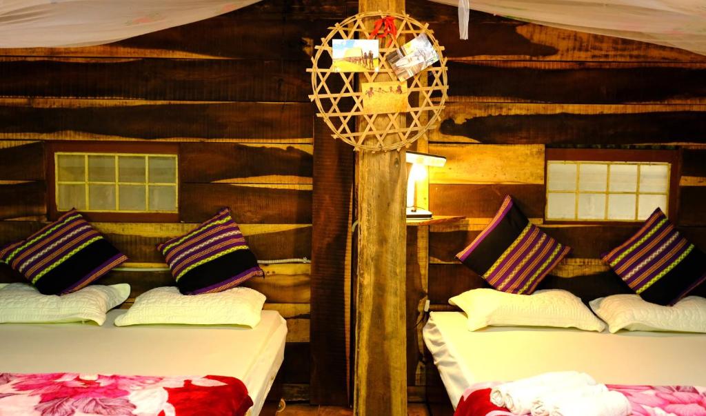 Postel nebo postele na pokoji v ubytování Plei Homestay & Café