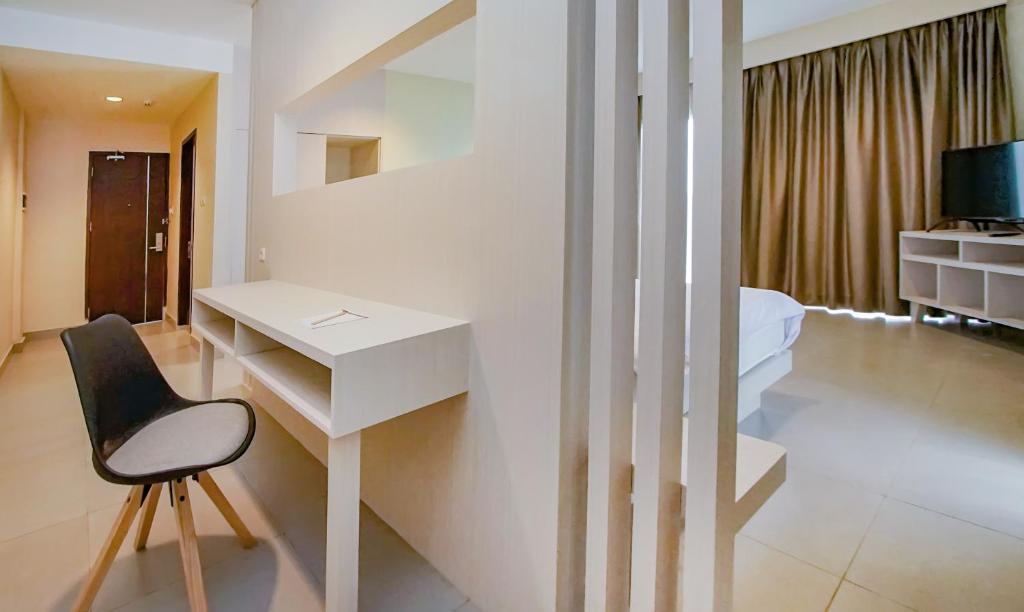 TV a/nebo společenská místnost v ubytování Dafam Resort Belitung