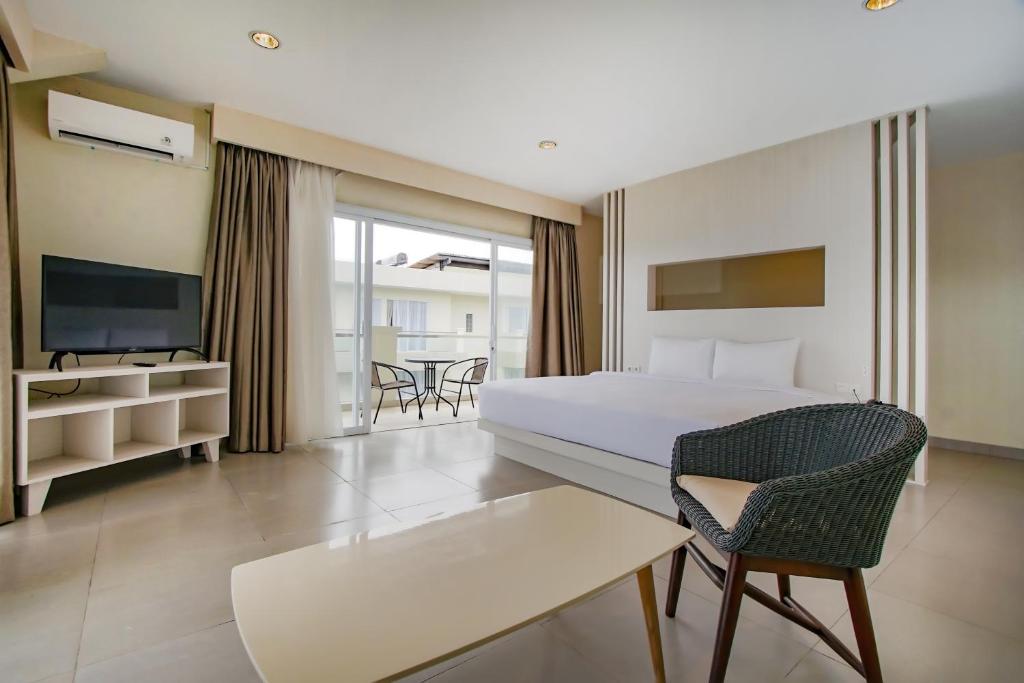 TV a/nebo společenská místnost v ubytování Dafam Resort Belitung